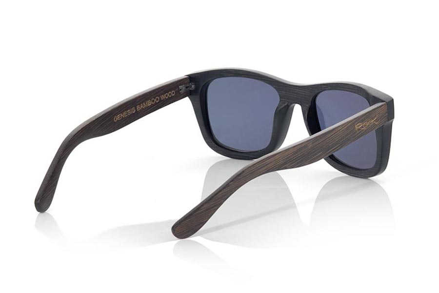 Wood eyewear of  GENESIS. Genesis Wood Sunglasses are made in two-tone tinted bamboo with black front and dark brown sideburns. In classical forms, the Genesis is a unisex model, elegant and discreet, however they will not be able to stop looking at you. frontal measurement:  146x50mm for Wholesale & Retail | Root Sunglasses® 