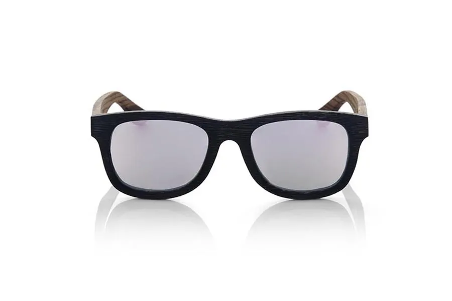Wood eyewear of Bamboo SANS S. SANS S sunglasses made of bamboo wood combining the front in natural bamboo with a black tinted with natural zebra wood sideburns coated with NEWSPAPERS pages, is a classic mount with a small size for people who the smaller glasses feel better. The SANS S are a ORIGINAL. The SANS S are an even more exclusive model since all the pages of newspapers used are different between. For this reason the model received may not be exactly the same as the model shown.  Frontal measurement: 136x44mm for Wholesale & Retail | Root Sunglasses® 