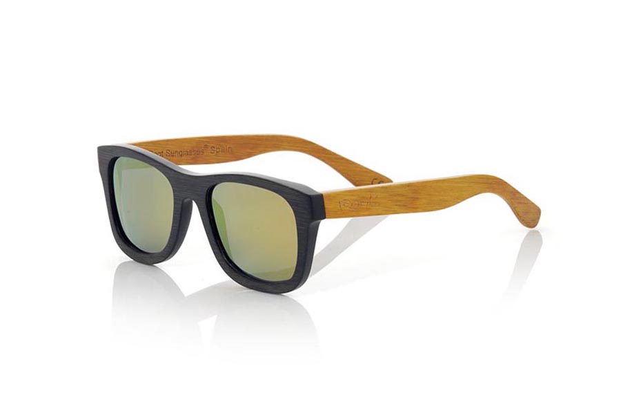 Wood eyewear of Bamboo ONEGA S. ONEGA S sunglasses are made of bamboo wood combining the front in natural bamboo with a black tinted with natural bamboo sideburns with a YELLOW tint, is a classic mount with a small size for people who feel better glasses  Small. The ONEGA S are a bet in YELLOW that keeps your eyes clean.  Frontal measurement: 136x44 for Wholesale & Retail | Root Sunglasses® 