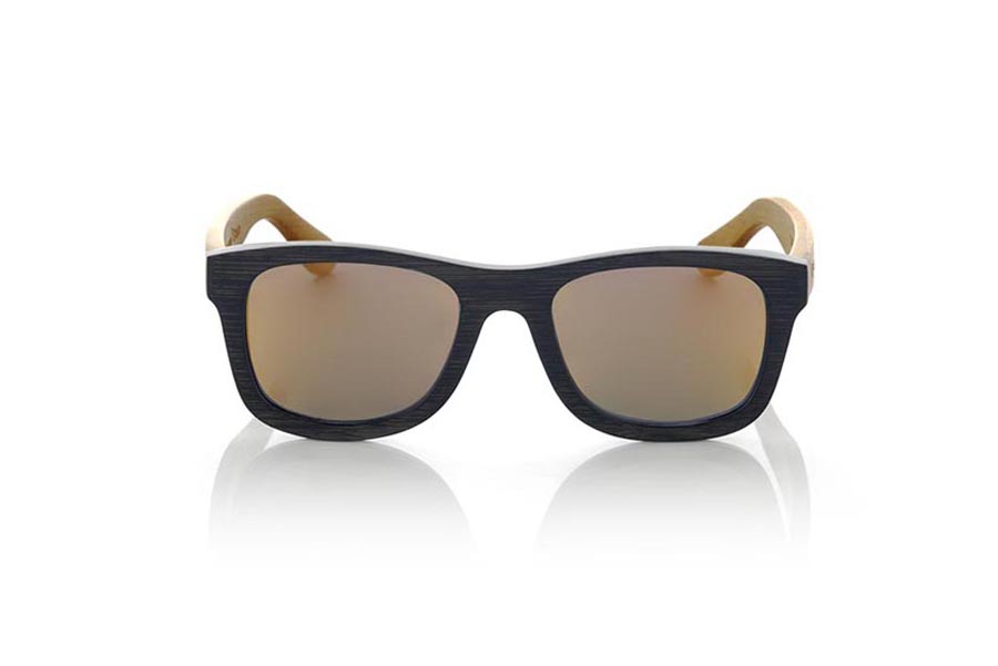 Gafas de Madera Natural de Bambú ONEGA S. Las gafas de sol OENGA S están realizadas en madera de bambú combinando el frontal en bambú natural con un tintado negro con las varillas en bambú natural con un tintado AMARILLO, es una montura clásica con un tamaño reducido para las personas a las que les sientan mejor las gafas más pequeñas. Las ONEGA S son una apuesta en AMARILLO que mantiene limpia tu mirada.  Medida frontal: 136x44 Venta al Por Mayor y Detalle | Root Sunglasses® 