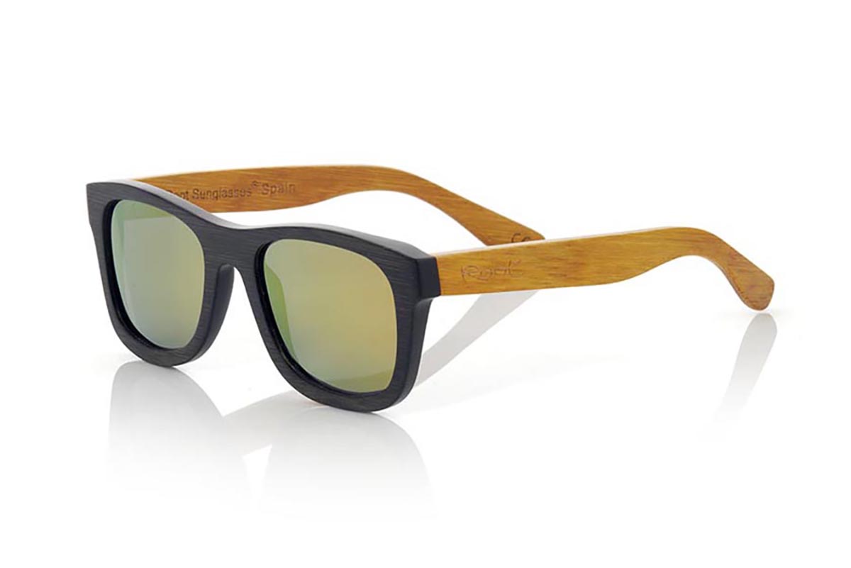 Wood eyewear of Bamboo ONEGA. ONEGA sunglasses are made of bamboo wood combining the frontal in natural bamboo with a black tinted with natural bamboo sideburns with a YELLOW tint, is a classic mount of a size that adapts well to all types of faces of both men and women . The ONEGA is a bet in blue that keeps your eyes clean.  Frontal measurement: 146x50 for Wholesale & Retail | Root Sunglasses® 