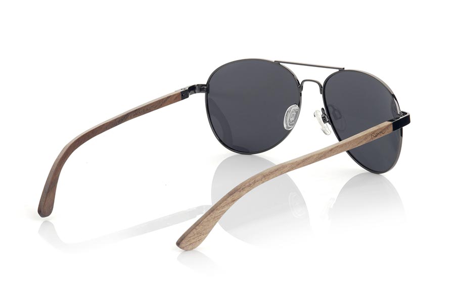 Wood eyewear of Zebrano MUNCHEN. MUNCHENsunglasses are made of black metal frame and natural Zebrano wood temples. A classic Aviator style model combined with several lenses to adapt to your personal style. You will love the combination in zebra wood. Front measurement: 150x50mm for Wholesale & Retail | Root Sunglasses® 