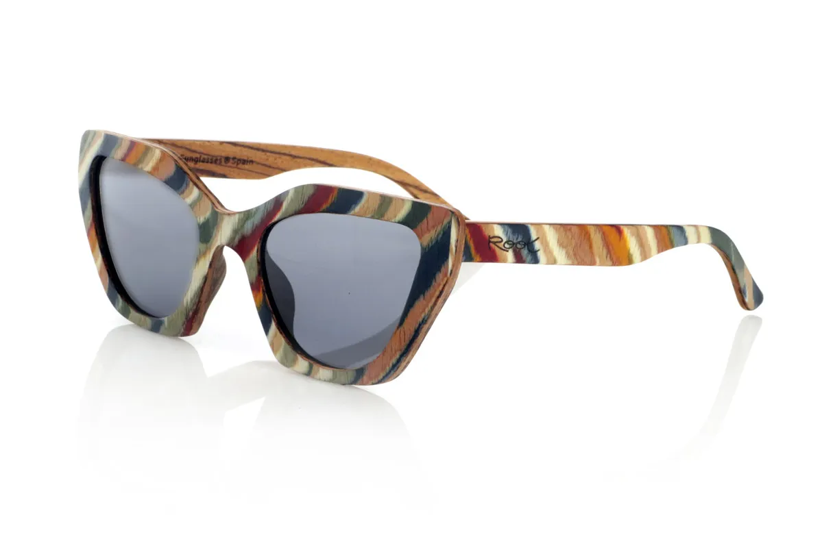Wood eyewear of Zebrano PAI. PAI wooden sunglasses are made from laminated skateboard wood, with a multi-coloured finish that highlights their distinctive design. Their layered structure highlights natural textures, combining a striking front with a zebrawood interior that provides an elegant contrast.

The butterfly-shaped design offers a bold and original silhouette, balancing style and comfort. Thanks to their laminated wood construction, they are resistant and light, ideal for daily use.

The high-quality polarised lenses fully protect against UV rays and reduce glare, providing a clearer and more comfortable vision. A different proposal within the wooden glasses collection, connecting design and natural materials.

Dimensions 144x50 mm. Caliber 53 for Wholesale & Retail | Root Sunglasses® 