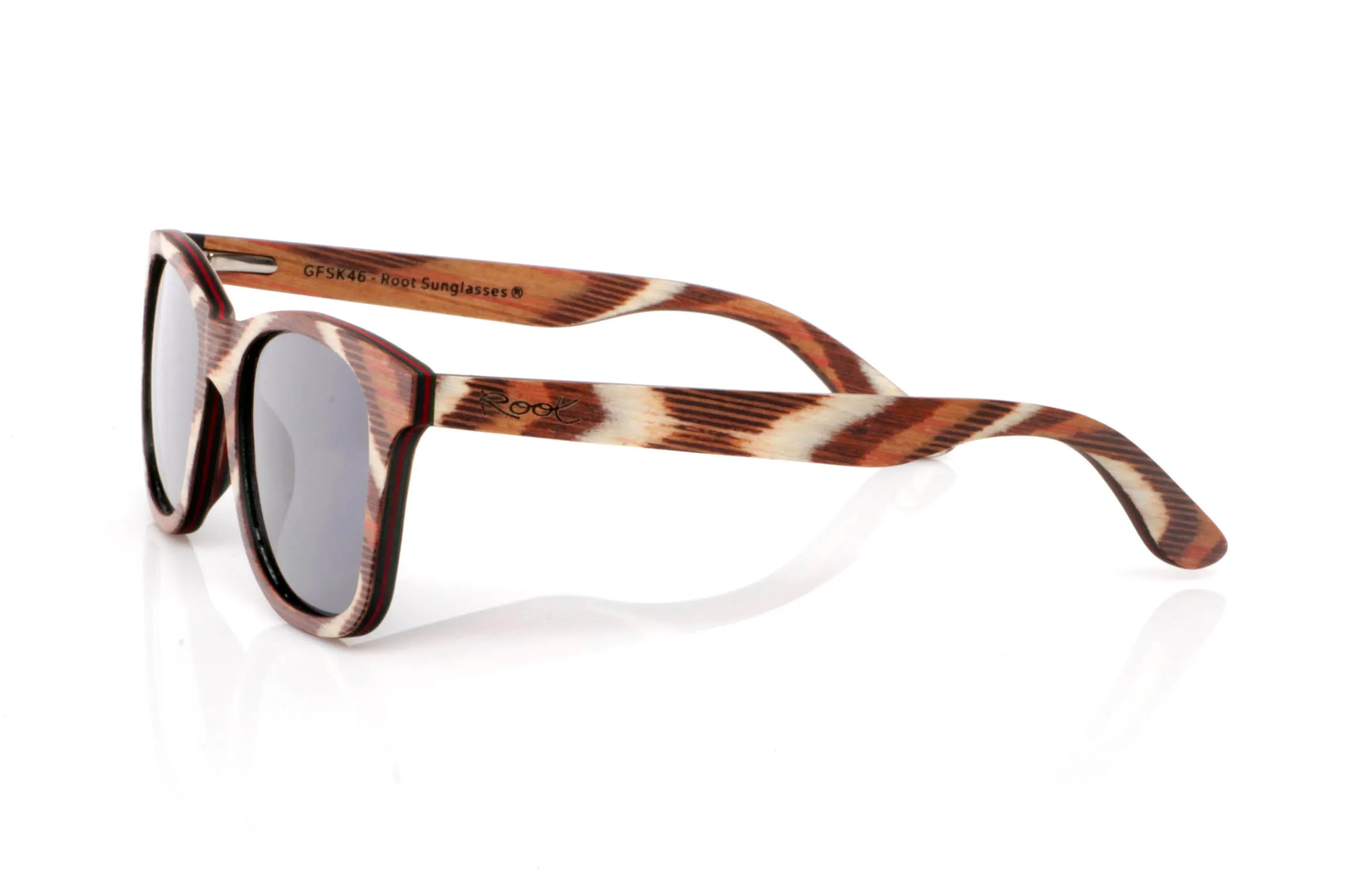 Wood eyewear of Maple BORACAI SK. BORACAI SK wooden sunglasses stand out for their textured front, blending earthy tones, cream and reddish hues into a warm, organic pattern. A design full of life where every piece feels unique.

The soft square shape keeps them balanced and easy to wear, while the maple finish enhances their natural and lightweight feel.

A frame with character, without being too bold. Natural, different, very Root.

Full UV protection.

Size: 142x48
Lens width: 52 for Wholesale & Retail | Root Sunglasses® 