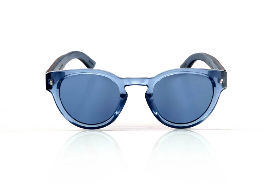 Wood eyewear of Walnut JANE. JANE Sunglasses with walnut wood temples, a translucent blue PC front, and a blue-tinted maple wood interior finish that matches the front. A model that stands out for its lightweight, modern, and balanced design suitable for smaller faces, perfect for those seeking style without sacrificing natural materials. Polarized lenses with UV protection for optimal visual comfort. Measurements: 139 x 50 mm. Caliber 47. for Wholesale & Retail | Root Sunglasses® 