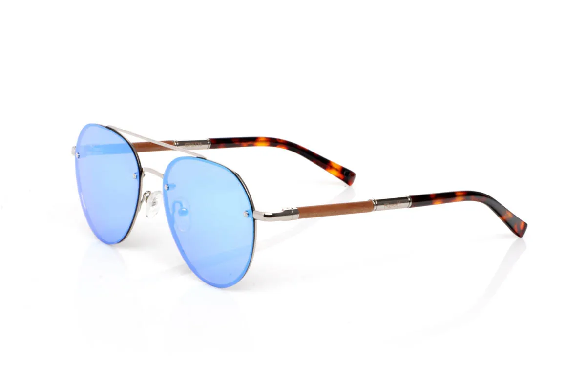 Wood eyewear of Walnut BONIN ST. The BONIN ST sunglasses combine a clean metal front with the natural strength of walnut wood, creating a lightweight, honest and no-frills balance. The rounded shape, with an aviator feel, fits easily and brings a timeless sense of style.

The walnut wood temples make the difference. Visible grain, warm touch and an authentic feel you notice from the very first moment. They are comfortable, stable and full of character without effort. The kind of sunglasses that fit you without having to think about it.

Size: 145x50
Lens width: 54
 for Wholesale & Retail | Root Sunglasses® 