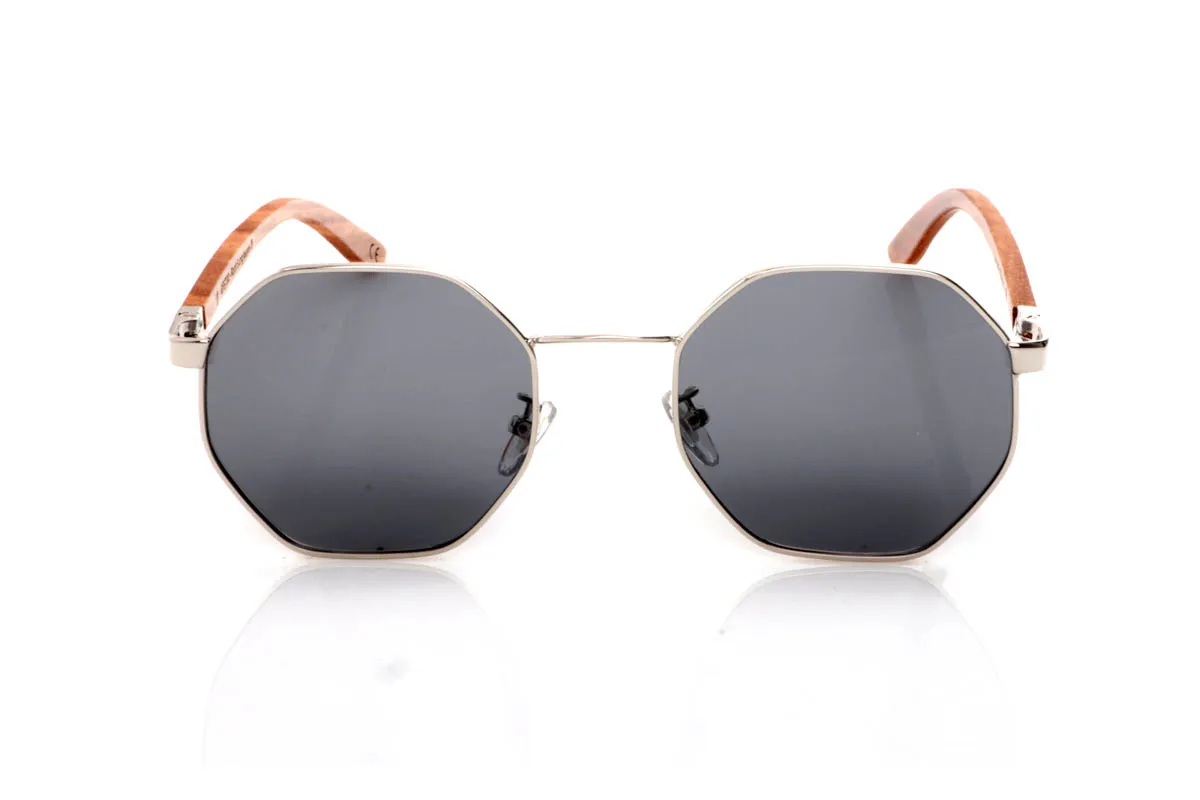 Wood eyewear of Zebrano DANAE. The DANAE ZEBRANO wooden sunglasses stand out for their balanced geometric shape, with a lightweight metal front that brings visual clarity and a contemporary feel. A design that sits between organic and structured, enhancing the face without feeling excessive, making them easy to wear every day.

The zebrano wood temples add character and texture, with a distinctive grain that creates a unique and natural visual effect. The contrast between metal and wood reinforces their personality while keeping them lightweight and comfortable. The kind of sunglasses that add style without trying too hard.

Full UV protection.

Size: 140x50
Lens width: 53 for Wholesale & Retail | Root Sunglasses® 