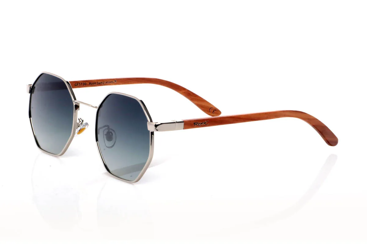 Wood eyewear of Zebrano DANAE. The DANAE ZEBRANO wooden sunglasses stand out for their balanced geometric shape, with a lightweight metal front that brings visual clarity and a contemporary feel. A design that sits between organic and structured, enhancing the face without feeling excessive, making them easy to wear every day.

The zebrano wood temples add character and texture, with a distinctive grain that creates a unique and natural visual effect. The contrast between metal and wood reinforces their personality while keeping them lightweight and comfortable. The kind of sunglasses that add style without trying too hard.

Full UV protection.

Size: 140x50
Lens width: 53 for Wholesale & Retail | Root Sunglasses® 